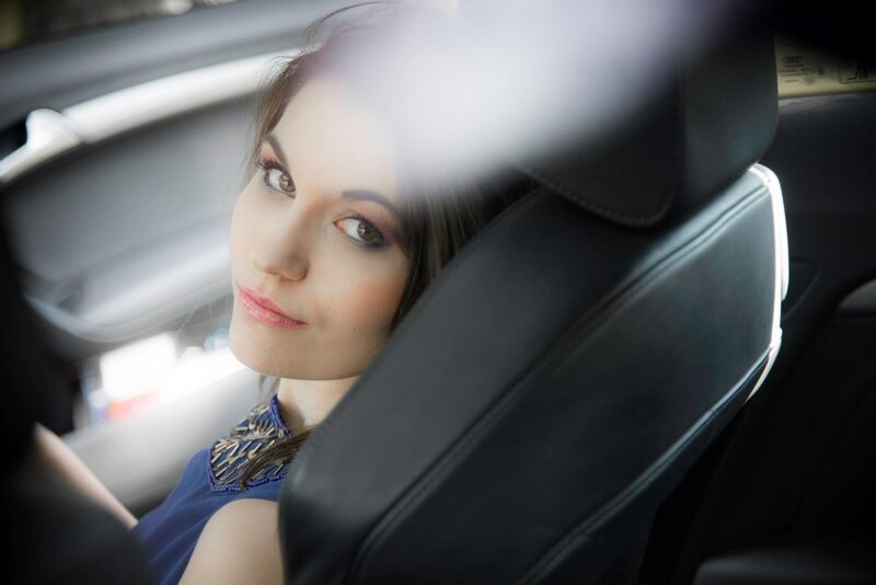 woman sitting in car