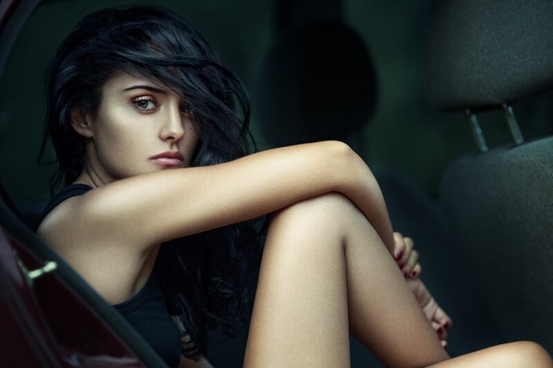 woman sitting in car