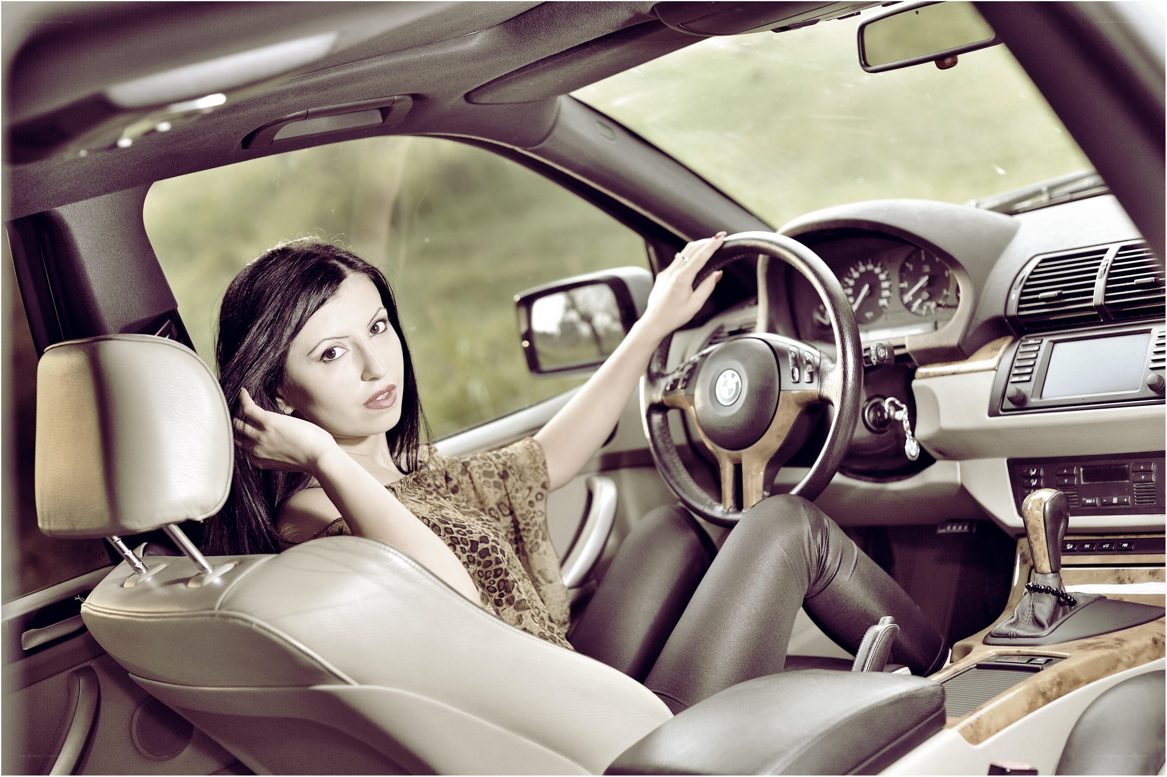woman sitting in car interior