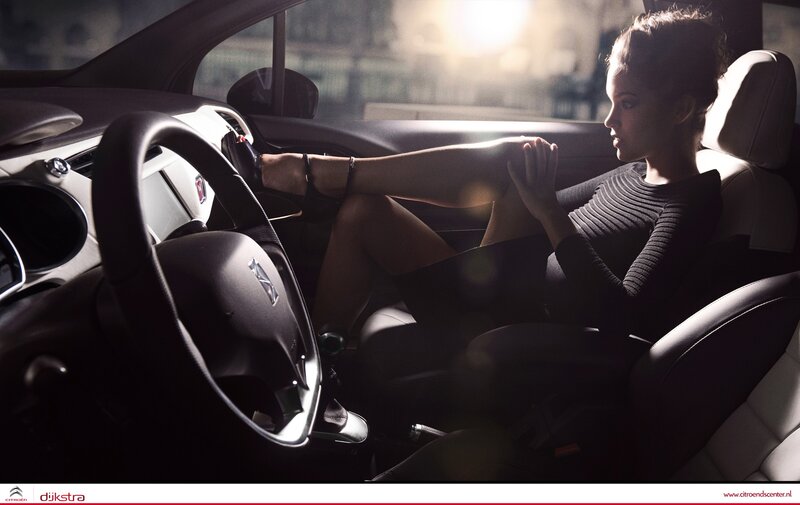 woman sitting in car interior