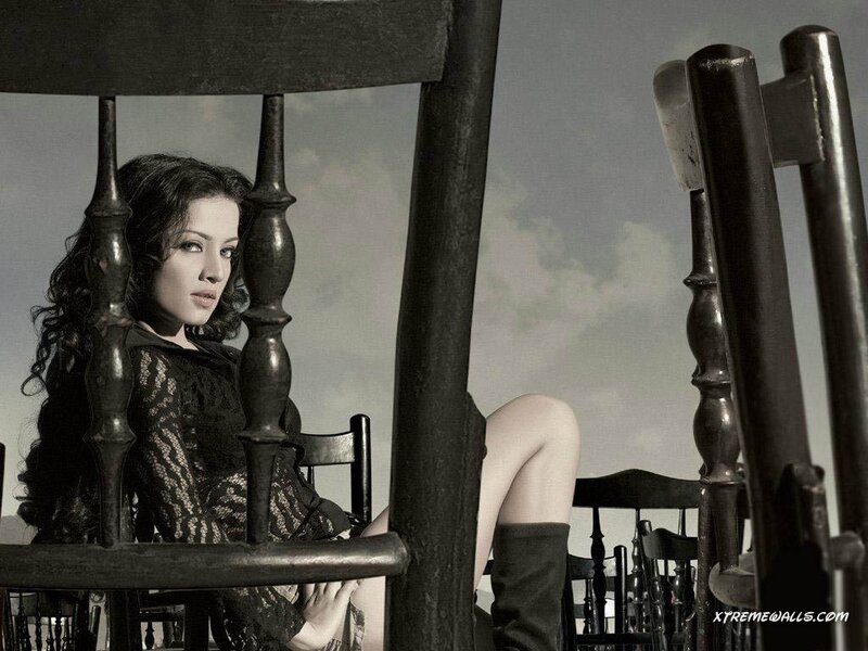 Woman Sitting in Chair — Black, Dramatic, Photograph, Leg