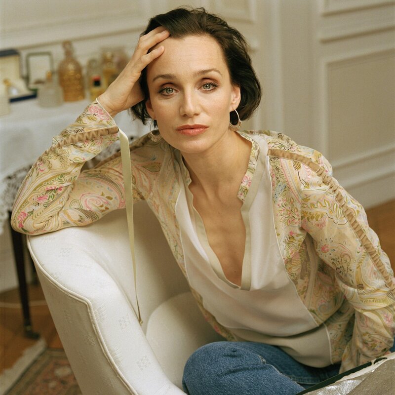 Woman Sitting in Chair — White, Calm, Photograph