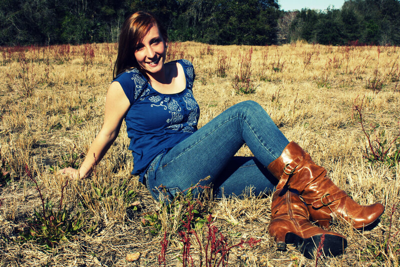 Woman Sitting in Field — Blue