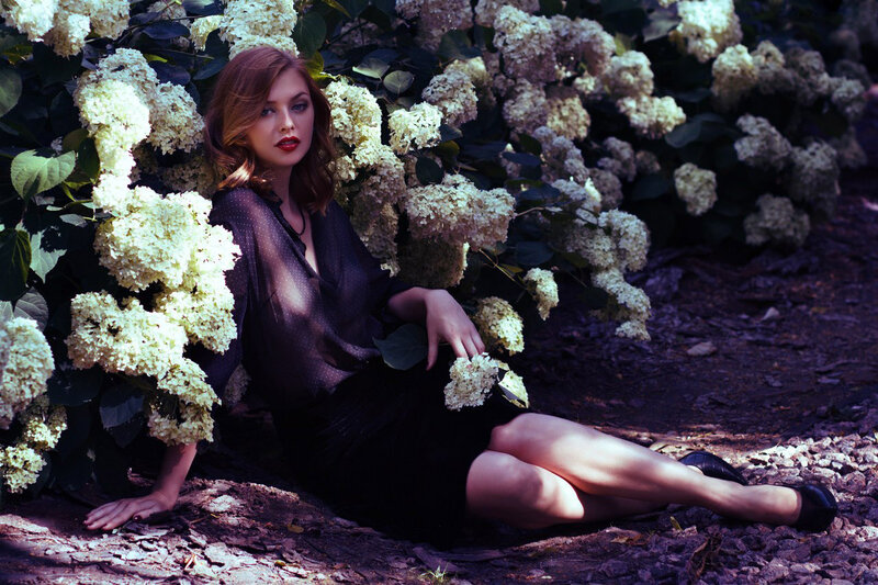 Woman Sitting in Flowers — Black