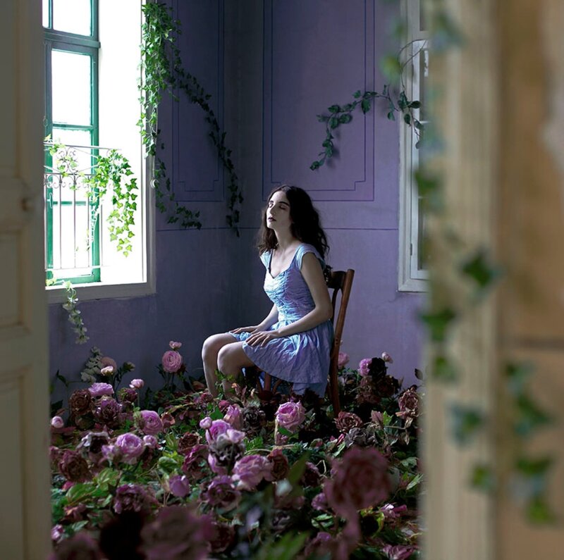 Woman Sitting in Flowers — Purple