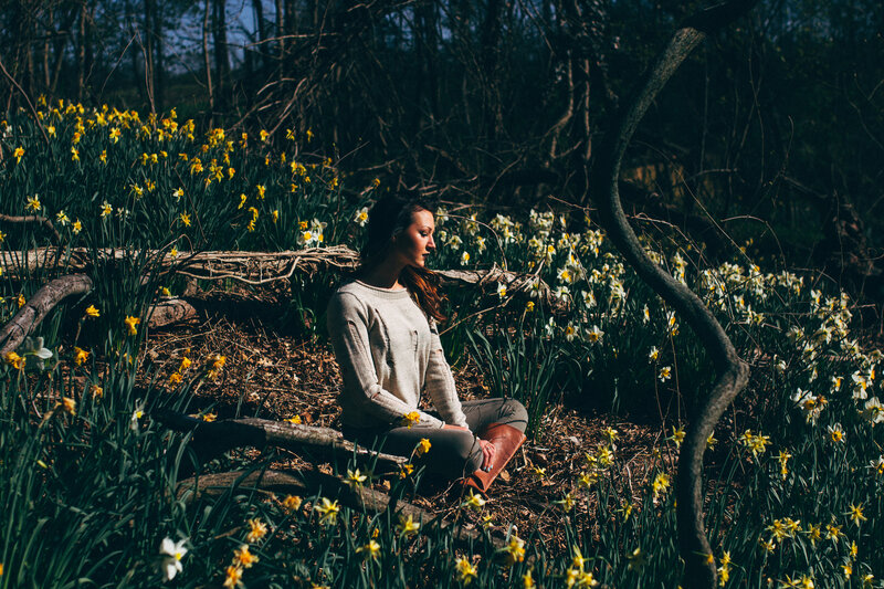 Woman Sitting in Flowers — Yellow