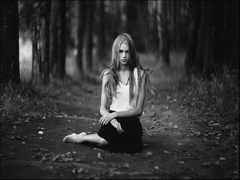 Woman Sitting in Forest — Black, Somber