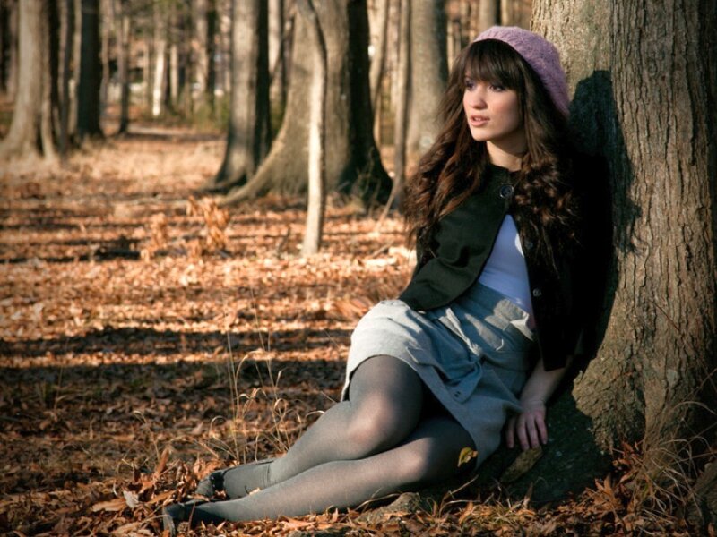 Woman Sitting in Forest — Brown