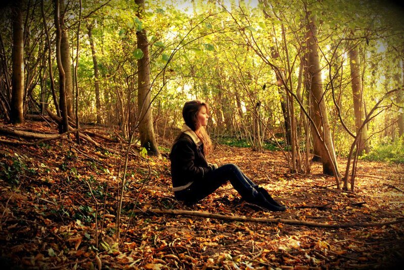 Woman Sitting in Forest — Green, Serene
