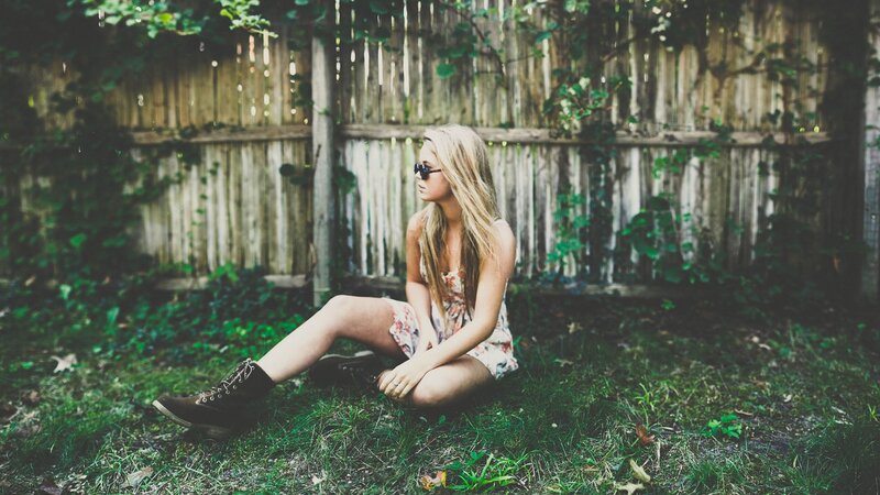 woman sitting in garden