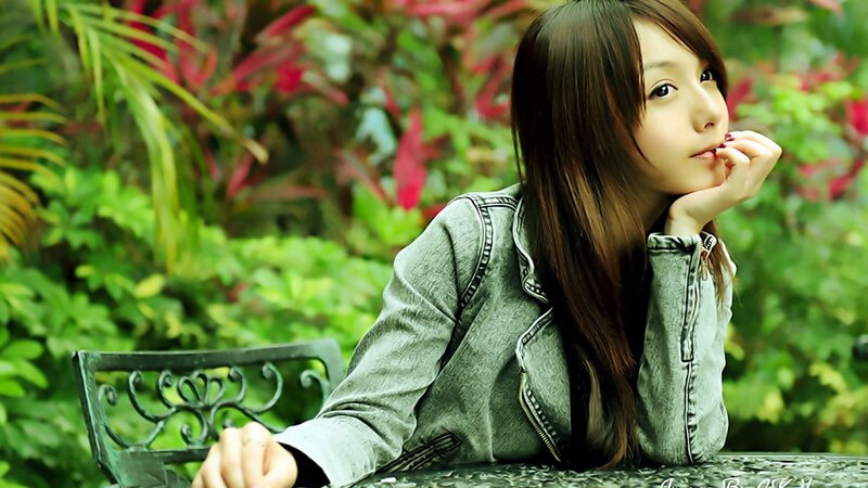 woman sitting in garden