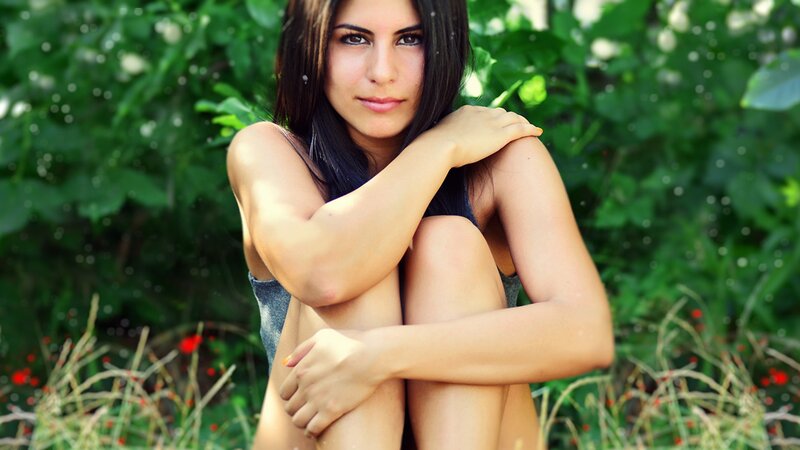 woman sitting in garden