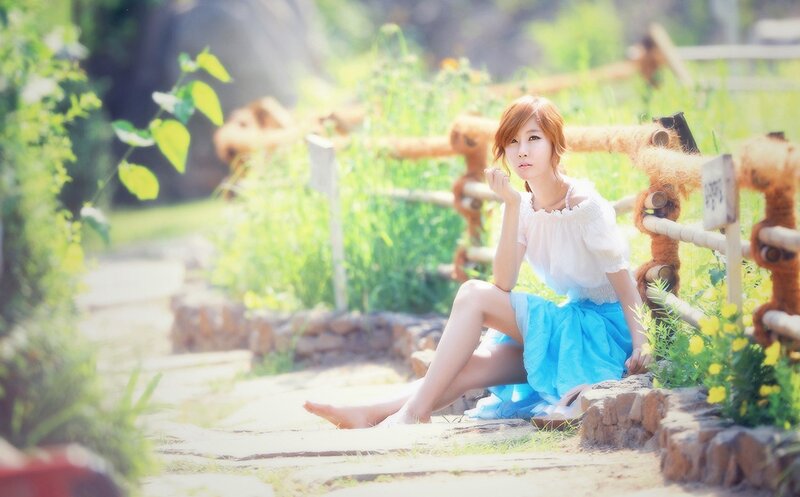 woman sitting in garden