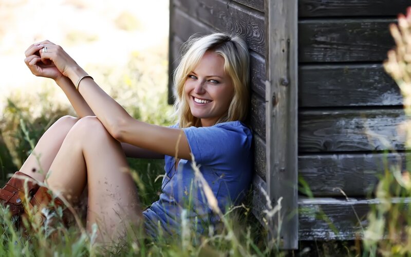 Woman Sitting in Grass — Blue, Relaxed