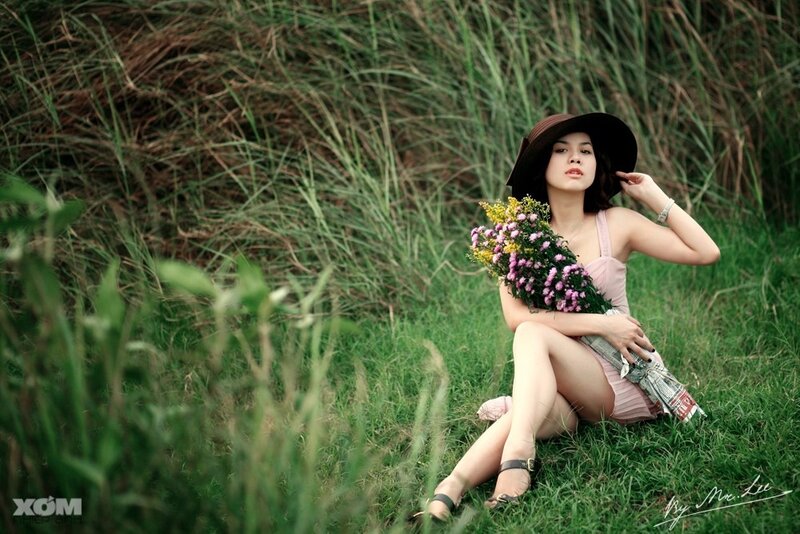 Woman Sitting in Grass — Green, Serene, Afternoon, Photograph