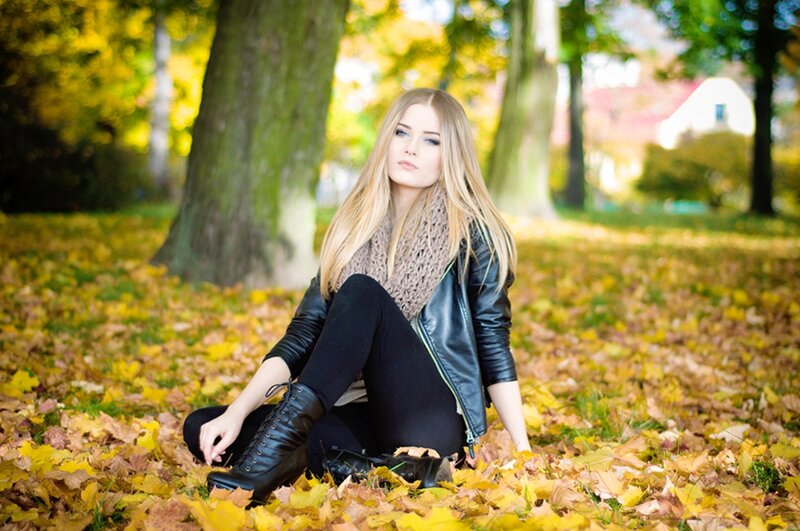 Woman Sitting in Leaves — Yellow