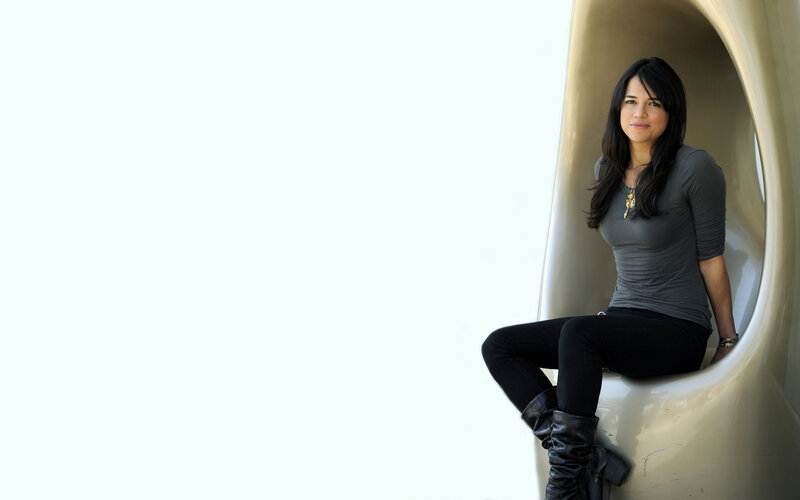 woman sitting in modern sculpture