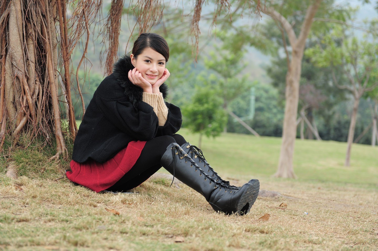 Woman sitting in park