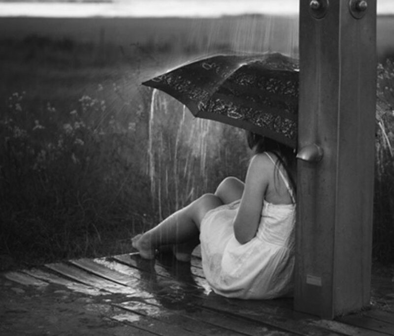 Woman Sitting in Rain — Black, Melancholic