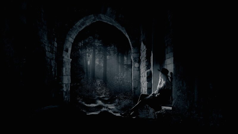 Woman Sitting in Ruin — Black