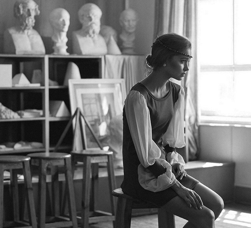 Woman Sitting in Studio