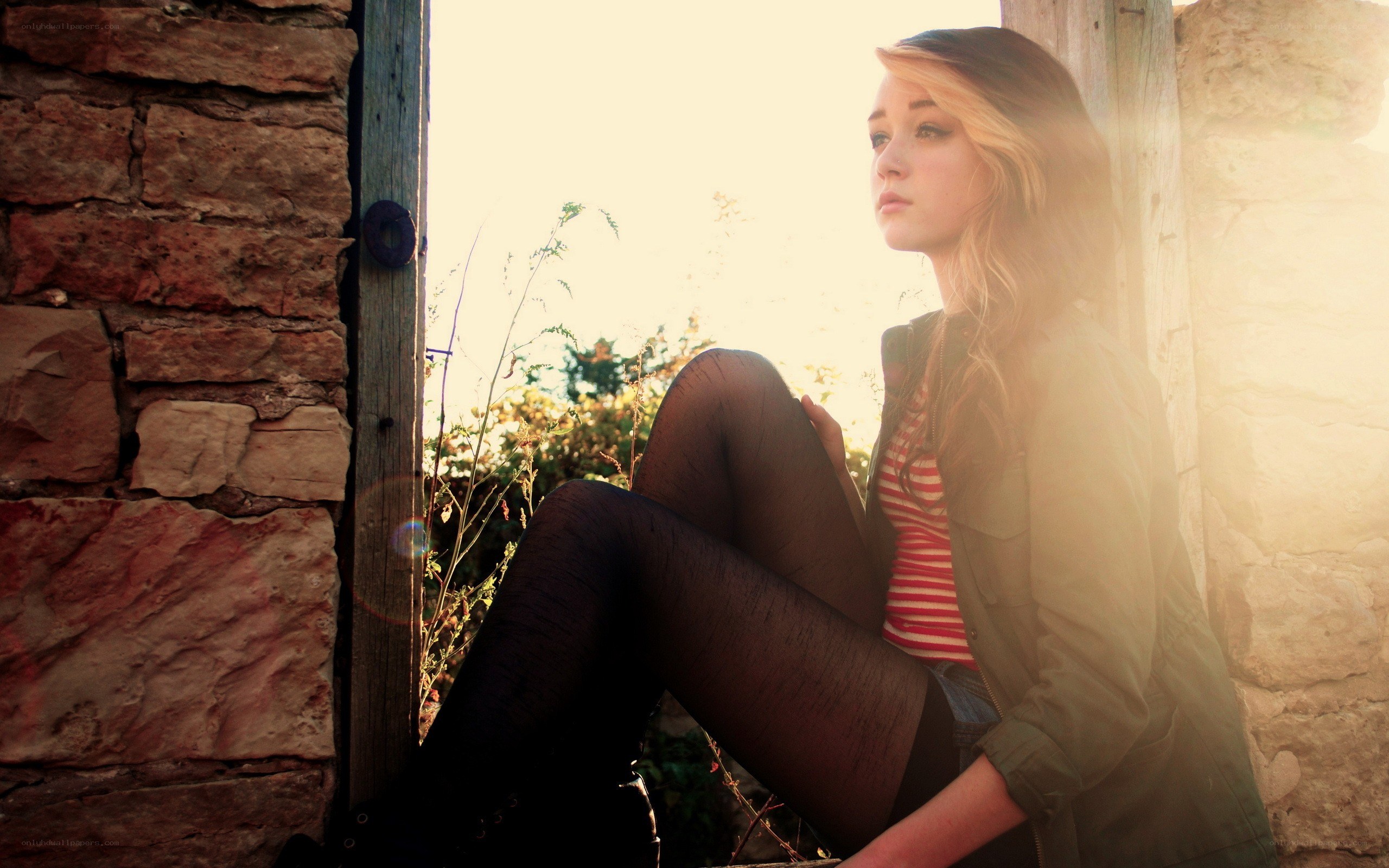 woman sitting in sunlight