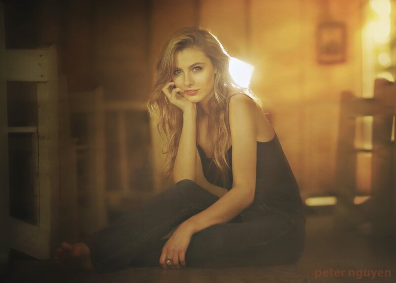 woman sitting in warm light
