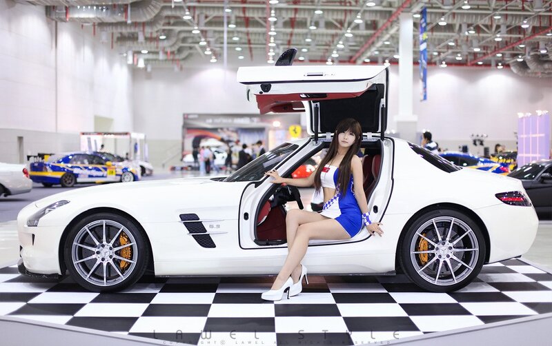 Woman Sitting in White Car