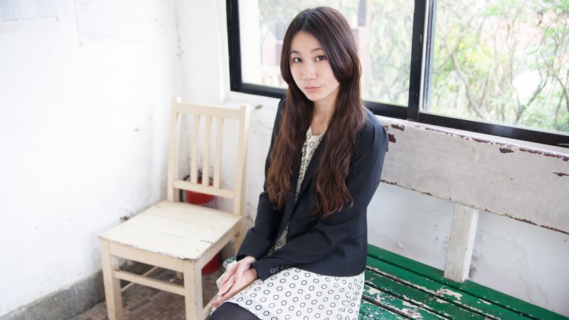 woman sitting on a bench