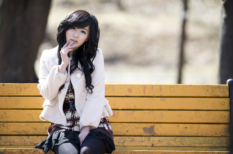 woman sitting on a bench