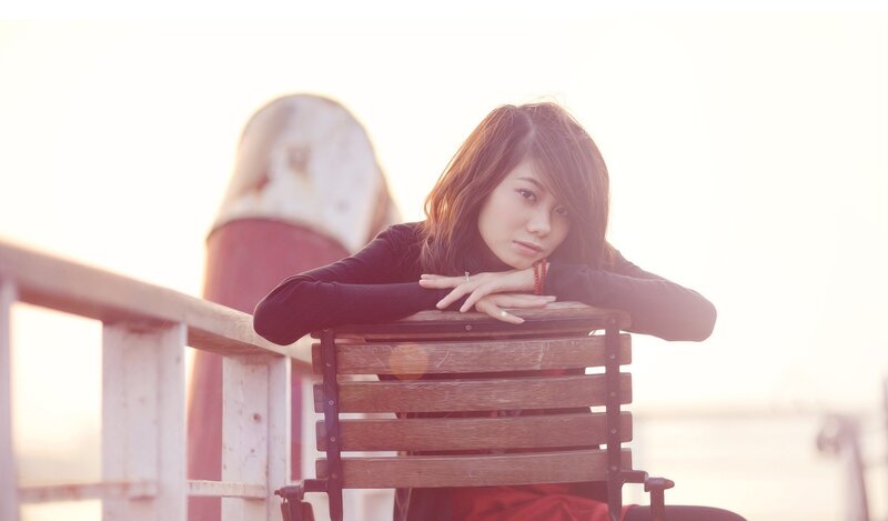 woman sitting on a bench