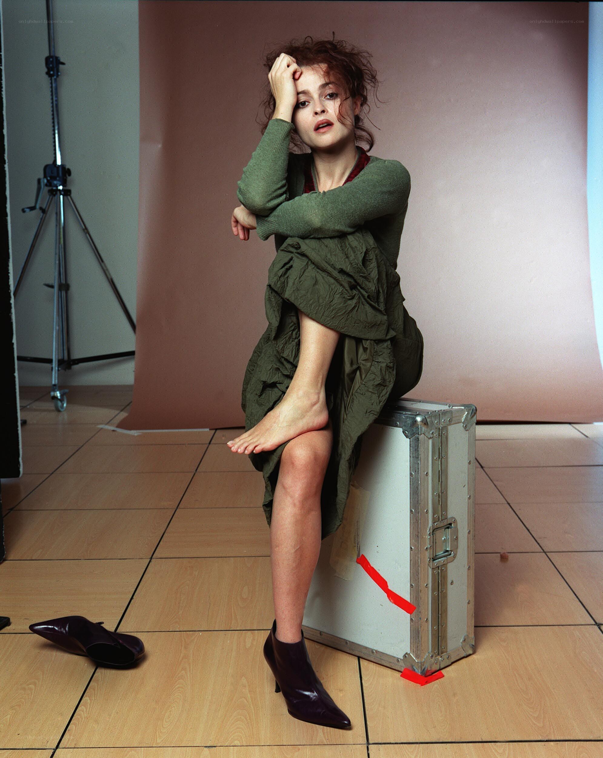 woman sitting on a case