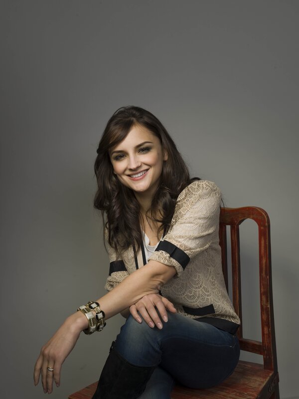 woman sitting on a chair smiling