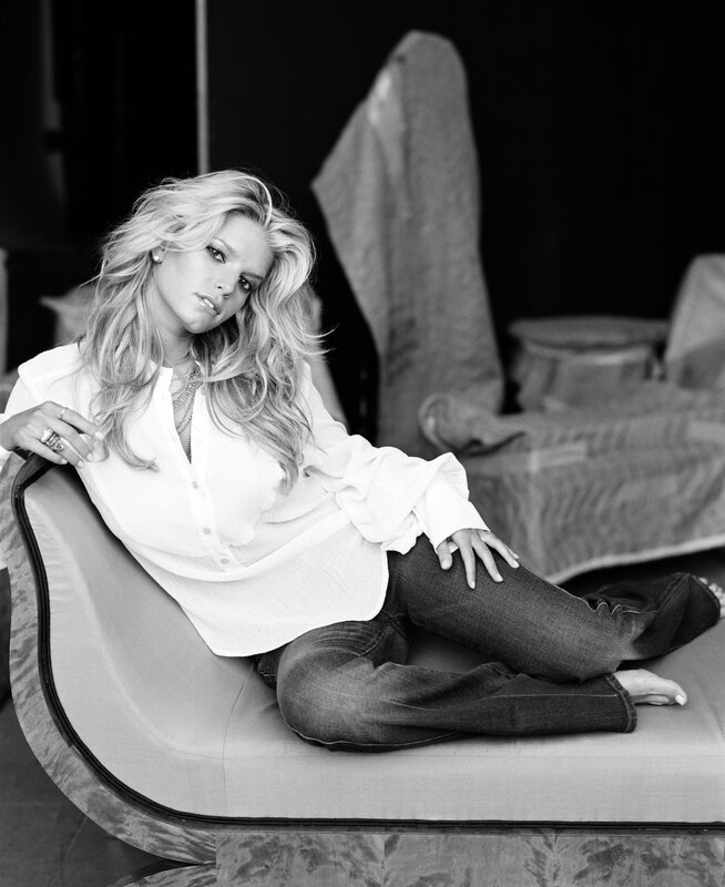 woman sitting on a chaise lounge