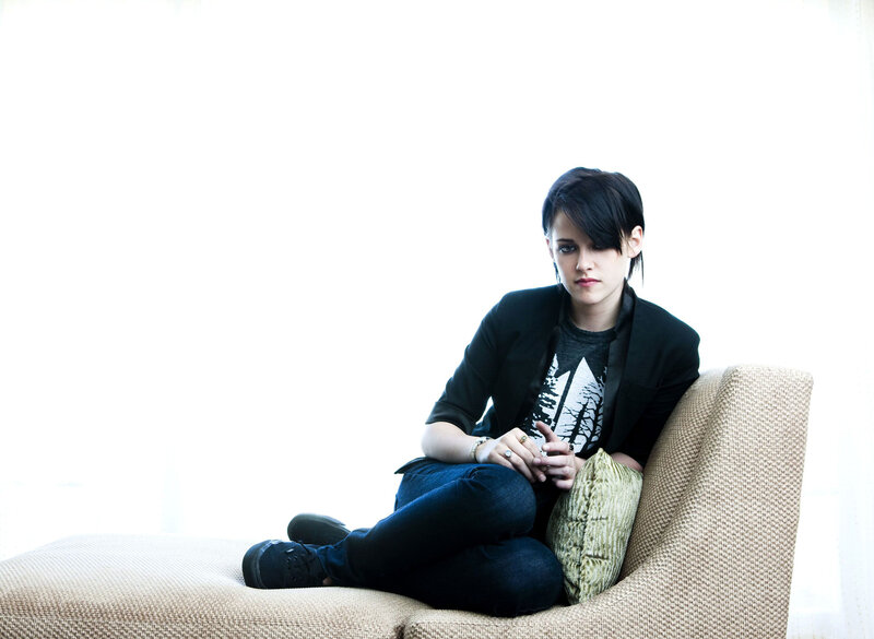 woman sitting on a chaise lounge