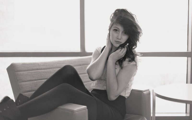 woman sitting on a couch