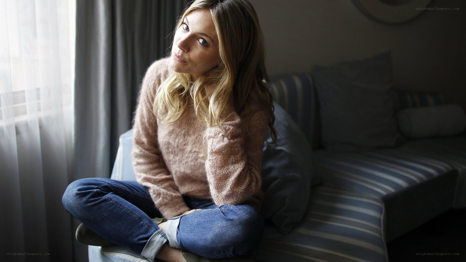 woman sitting on a couch