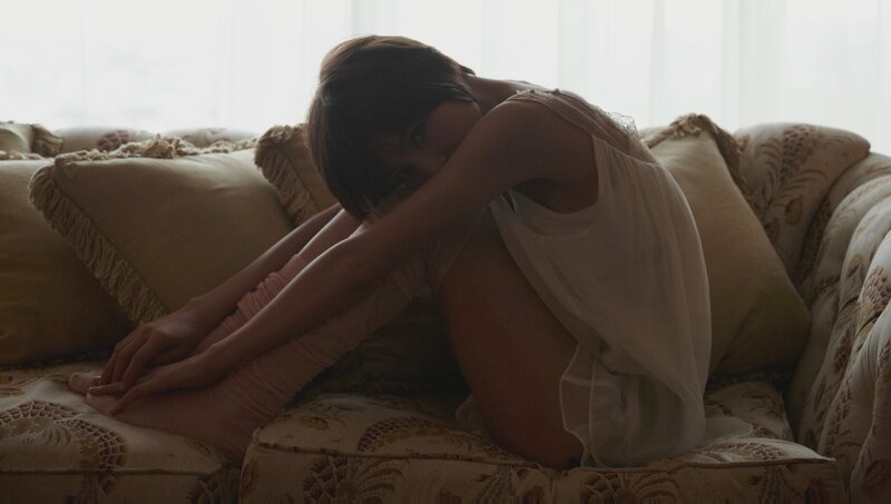 woman sitting on a couch