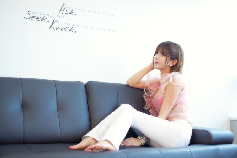 woman sitting on a couch