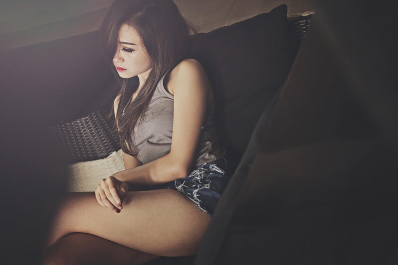 woman sitting on a couch