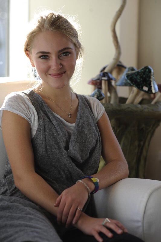 woman sitting on a couch