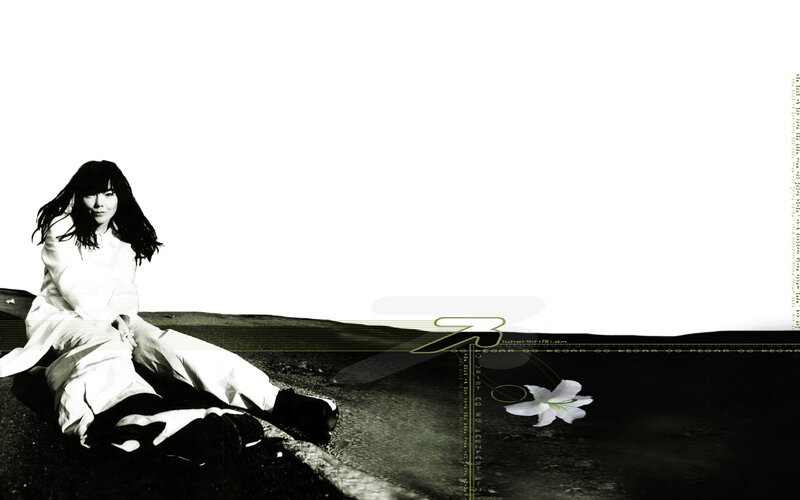woman sitting on a hill