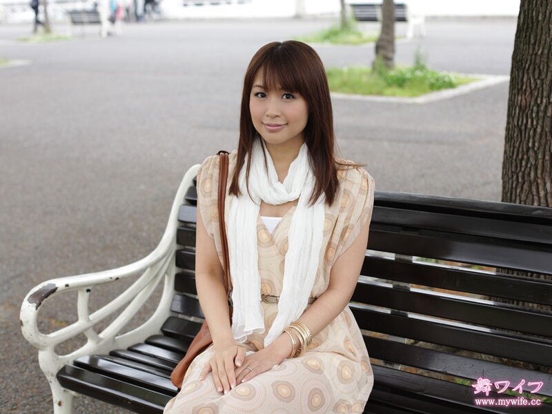 Woman sitting on a park bench