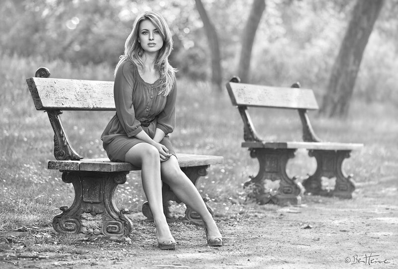 Woman sitting on a park bench