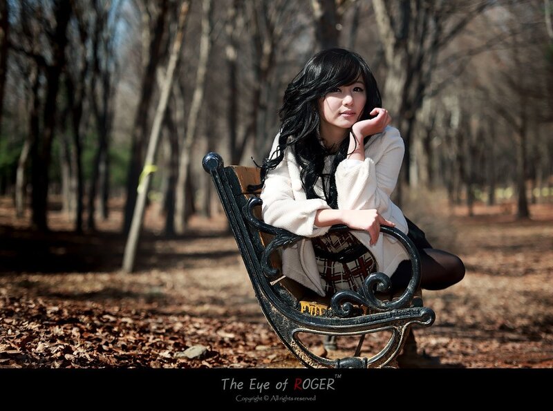 Woman sitting on a park bench