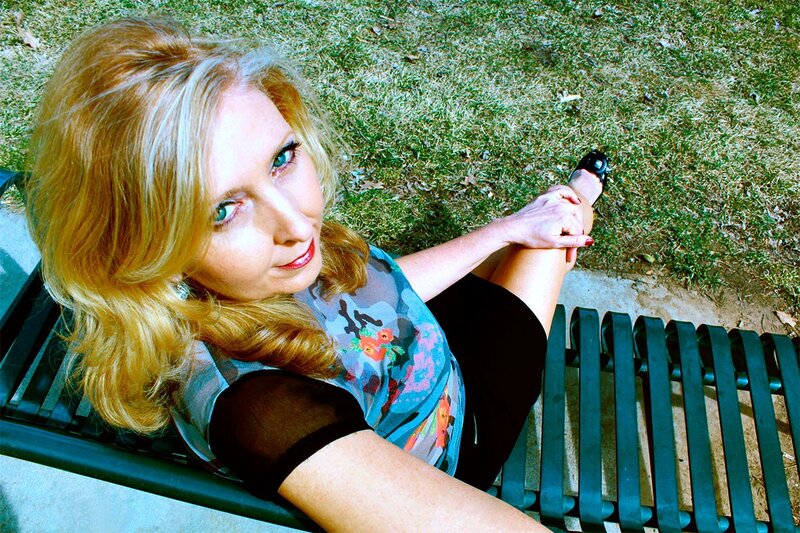 woman sitting on a park bench