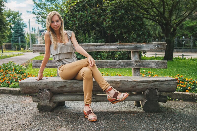Woman sitting on a park bench