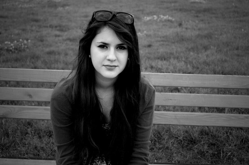 woman sitting on a park bench