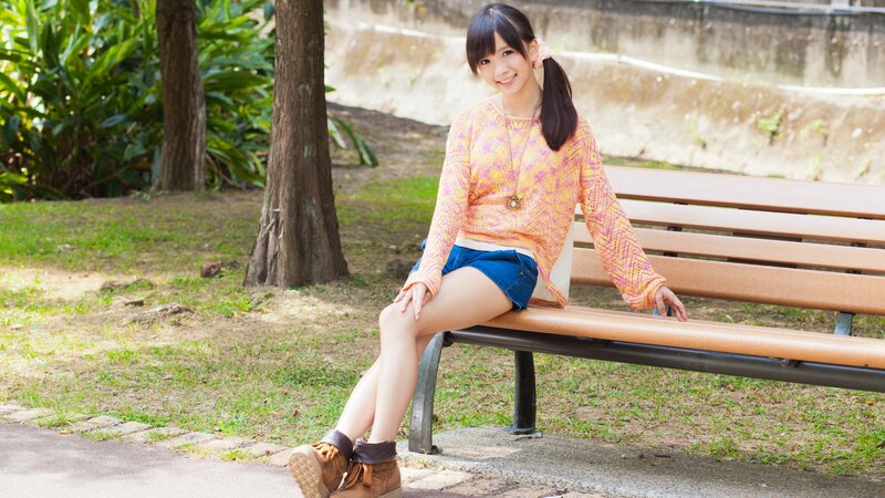 Woman sitting on a park bench
