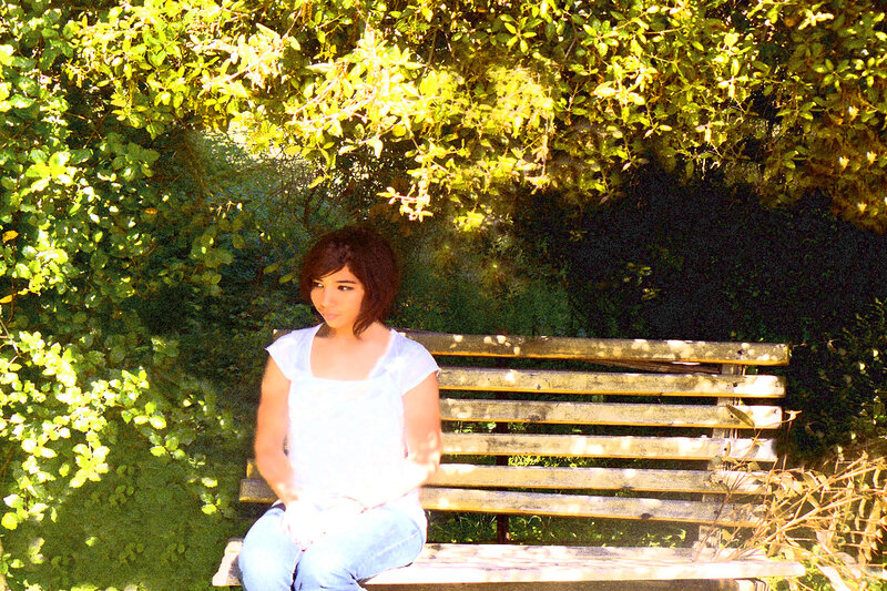 Woman sitting on a park bench